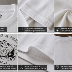 May include: A white t-shirt featuring a black graphic print of a tent, mountains, and pine trees with the text WILD & FREE and EXPLORE MORE. The shirt has a reinforced crew neck, double-stitched seams, and is made of 190g/m2 cotton fabric.