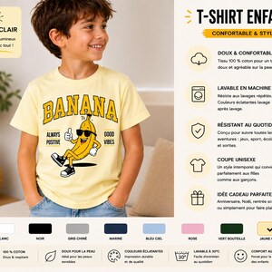 K&ouml;nnte beinhalten: Ein hellgelbes Kurzarm-T-Shirt mit einer Grafik einer Cartoon-Banane, die eine Sonnenbrille und Turnschuhe tr&auml;gt. Der Text BANANA ist in gro&szlig;en Buchstaben &uuml;ber der Figur gedruckt, mit den Worten ALWAYS POSITIVE und GOOD VIBES an den Seiten.