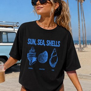 Bring effortless seaside energy to your summer wardrobe with this Sun Sea Shells Shirt 🌊