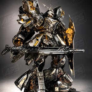 May include: A detailed, metallic robot figure with silver and gold accents, holding a large weapon. The figure has intricate armor plating and a shield. The AsterForgeStudio logo is visible in the top left corner.