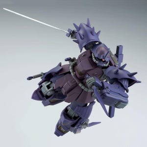 May include: A purple articulated robot action figure featuring spiked shoulder armor, a mono-eye sensor, and a long thin sword held in one hand. The figure is posed in a dynamic mid-air stance with mechanical details visible on the limbs and torso.