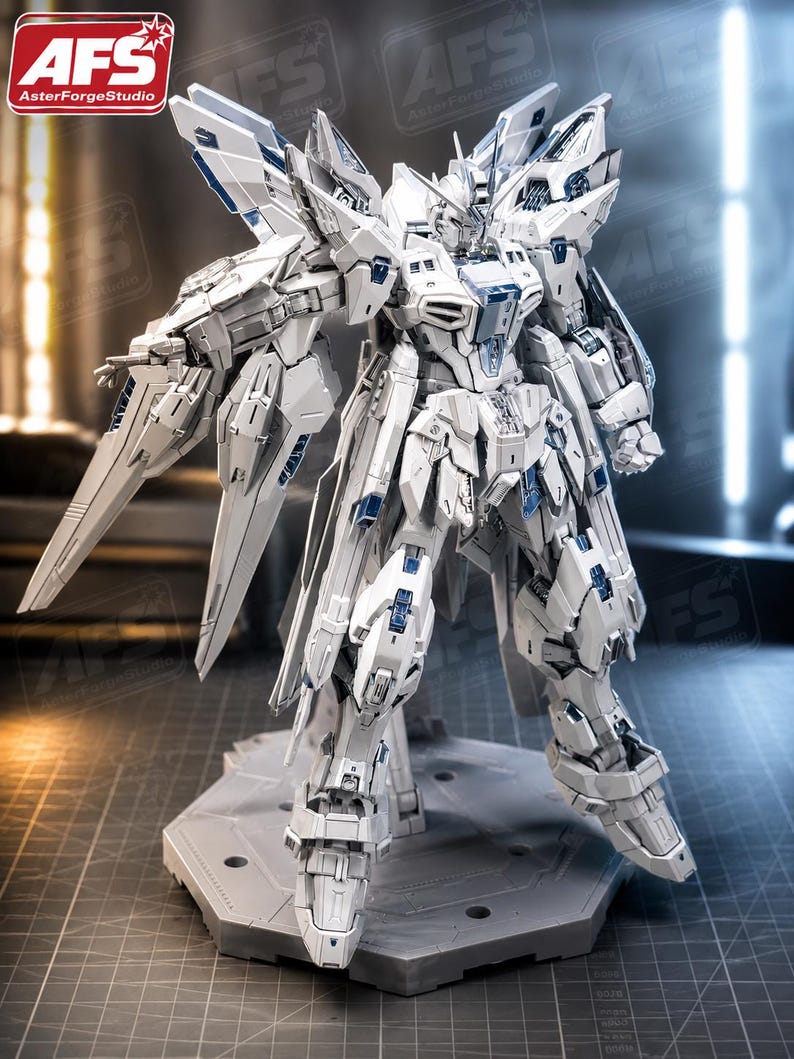 May include: A white and blue model robot figure with intricate details, standing on a gray hexagonal base. The figure has large wings and a sword. The logo "AFS AsterForgeStudio" is visible in the top left corner.