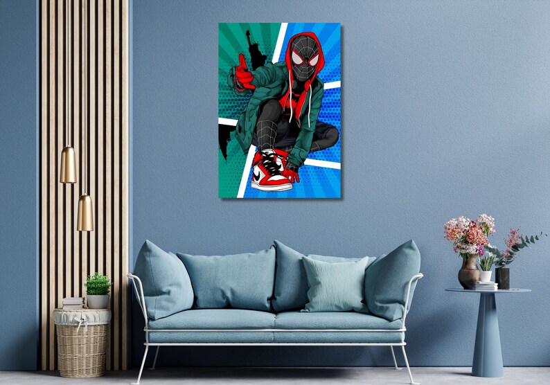 May include: A rectangular wall art print featuring a stylized illustration of a masked character in a black and red suit, wearing a green hooded jacket and red and white sneakers, set against a vibrant green and blue comic book style background.