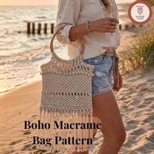 May include: A cream-colored macrame bag featuring a circular wooden handle, intricate knotted patterns, and a long fringe at the bottom. The bag displays a textured design with small decorative knots and a geometric pattern, finished with hanging cords.