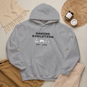 Gaming Evolution hoodie | Retro Controllers, Headset, EST. 1990