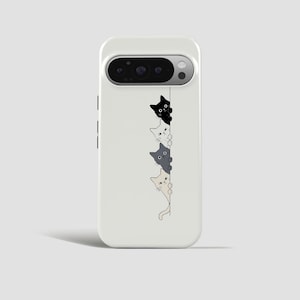 May include: A white smartphone case featuring a vertical line graphic with four illustrated cats peeking out from behind it. The cats are colored black, white, gray, and beige, each with simple line-drawn features and paws visible along the edge.