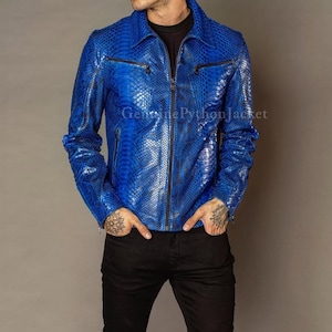 May include: A vibrant blue jacket featuring a textured snakeskin pattern, a classic collar, and a full-length front zipper. The garment includes two horizontal zippered chest pockets and long sleeves, with the text Genuine Python Jacket visible.
