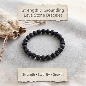 May include: A circular bracelet made of black, porous lava stone beads. The image includes text that reads Strength & Grounding Lava Stone Bracelet and Strength • Stability • Growth. A small, light brown burlap drawstring pouch is visible.
