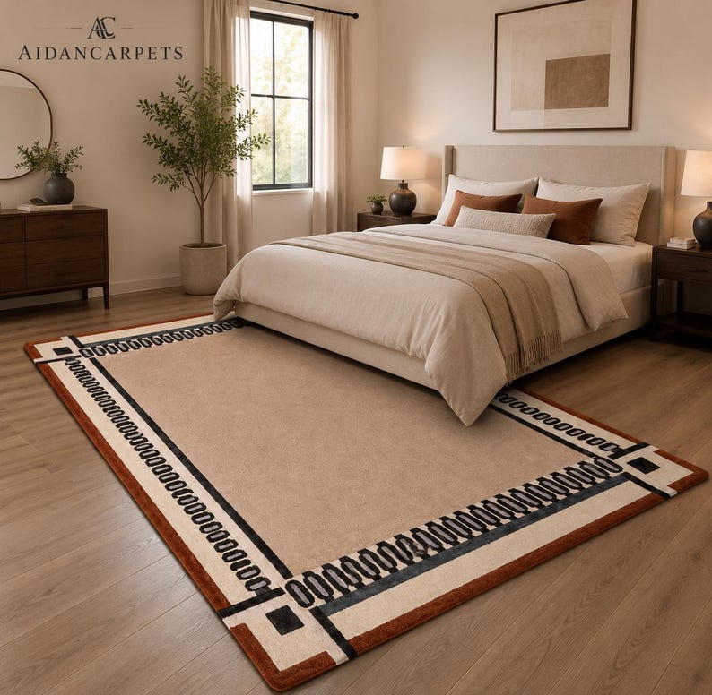 Designed for comfort and durability, this modern floor rug is soft underfoot while maintaining a sleek and polished appearance. The geometric border pattern adds artistic character without overwhelming the room, making it suitable for both large open spaces and compact interiors. Its timeless neutral tones allow effortless styling across all seasons and décor trends.