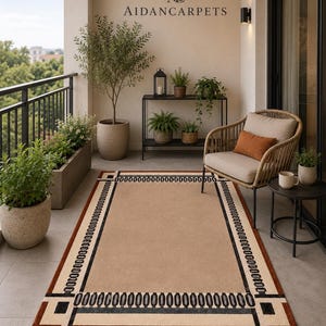 Designed for comfort and durability, this modern floor rug is soft underfoot while maintaining a sleek and polished appearance. The geometric border pattern adds artistic character without overwhelming the room, making it suitable for both large open spaces and compact interiors. Its timeless neutral tones allow effortless styling across all seasons and décor trends.
