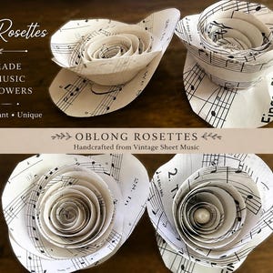 May include: Four paper flowers shaped like rosettes, crafted from white sheet music with black musical notation. The text Oblong Rosettes, Handmade Sheet Music Paper Flowers, Timeless, Elegant, Unique, and Handcrafted from Vintage Sheet Music is visible.