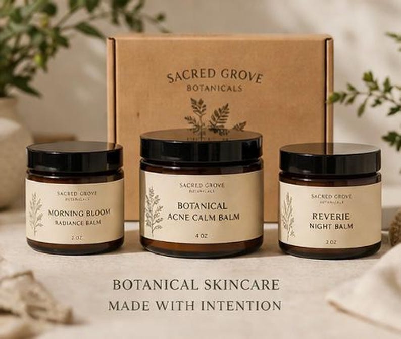 May include: Three glass jars with black lids and cream labels are displayed in front of a cardboard box. The jars contain botanical skincare products, including a radiance balm, acne calm balm, and night balm. The text "BOTANICAL SKINCARE MADE WITH INTENTION" is at the bottom.