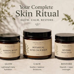 May include: Three glass jars with black lids are displayed, labeled "Morning Bloom Radiance Balm," "Botanical Acne Calm Balm," and "Reverie Night Balm." The text "Your Complete Skin Ritual" and product benefits are also shown. The jars are 2 and 4 oz.
