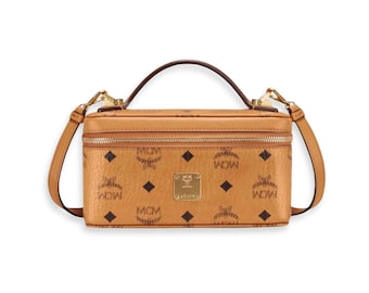 Estuche de tocador Rockstar marrón de MCM, mini bolso de mano de diseñador con asa superior.