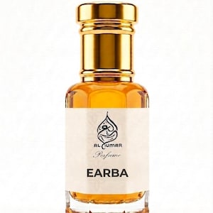 May include: A clear glass perfume bottle with a gold-coloured cap containing an amber-coloured liquid. The white label features a black calligraphic logo, the text AL UMAR Perfume, and the word EARBA in bold black capital letters on the front.