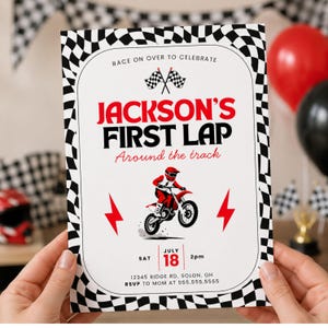 May include: A white invitation with a black and white checkered border. The invitation reads "JACKSON'S FIRST LAP" with a graphic of a person on a red motorcycle. Additional text includes date, time, and location.