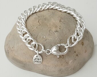 silver bracelet with double curb link chain and beautiful lobster clasp design easy to wear elegant every day piece