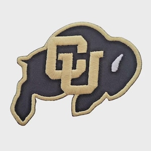 May include: Embroidered patch featuring the CU logo, a stylized buffalo with the letters "CU" in gold. The buffalo is black with a gold outline and a white detail. Ideal for apparel or accessories.