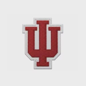 May include: A red and white embroidered patch featuring the stylized letter "I" with a "U" shape on top. The patch has a white border and a red interior, with a textured appearance.