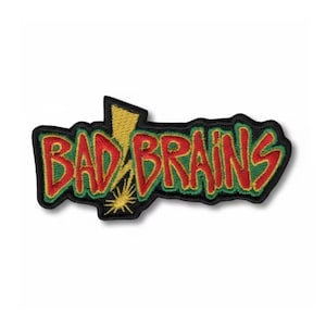 Könnte beinhalten: Gestickter Aufnäher mit den Worten "BAD BRAINS" in Rot, umrandet in Grün, auf schwarzem Hintergrund. Ein gelber Blitz und ein Sonnenstrahl-Design befinden sich in der Mitte des Textes.