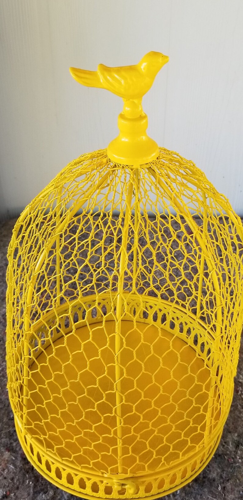 Bright yellow repainted vintage dome bird cage