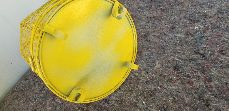 Bright yellow repainted vintage dome bird cage