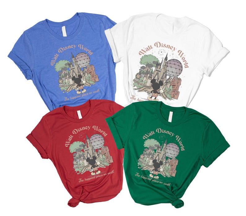 May include: Four t-shirts in blue, white, red, and green, each featuring a graphic of Mickey Mouse in front of a castle and a hot air balloon. The text "Walt Disney World" and "The happiest place on earth" are printed on each shirt.