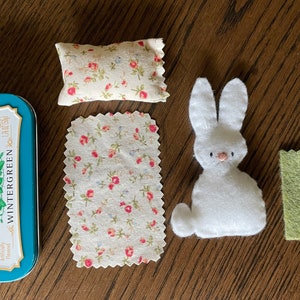 Pocket pal- White Bunny miniature toy up-cycled Red Altoids tin.