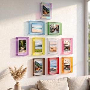 May include: A collection of ten rectangular acrylic picture frames in various colors including iridescent, blue, green, purple, yellow, clear, pink, brown, red, and orange, each displaying a different landscape or architectural photograph.