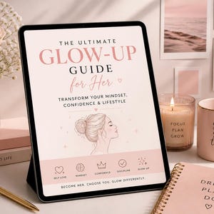 May include: A digital tablet displaying "The Ultimate Glow-Up Guide for Her" with a woman's silhouette. The image includes a pink mug with gold trim, a candle, a notebook, and a bouquet of pink roses. The text on the mug says "you got this."