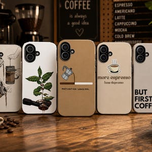 May include: Five rectangular phone cases arranged in a row, each featuring coffee-themed designs. The cases display illustrations of coffee makers, a coffee plant, a loading bar with text, and phrases including more espresso less depresso and but first, coffee.