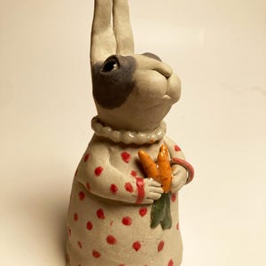 Gardening Rabbit in her pearls.