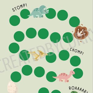 May include: A light green chart with the text "IT'S POTTY TIME!" and illustrations of dinosaurs. The chart features green circles and dinosaur-themed phrases like "STOMP!" and "ROAAAAR!"