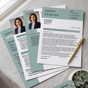 May include: A set of resume templates in a soft green and white color scheme, featuring a photo of a woman. A gold pen rests on the resumes, and a small succulent plant in a pot is in the foreground. The text "CV-VORLAGEN-SET" is visible.
