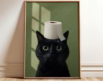 May include: A framed print featuring a black cat with a roll of toilet paper balanced on its head. The cat has large, round yellow eyes and a serious expression. The background is a muted green with a shadow pattern.