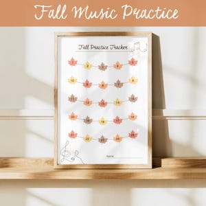 Puede incluir: Una impresión en papel blanco enmarcada titulada Fall Practice Tracker con cinco filas de hojas de otoño ilustradas en tonos naranja, amarillo y marrón. Cada hoja contiene un número del 1 al 25. Se ven una clave de sol y notas musicales.
