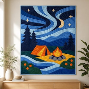 May include: A rectangular wall quilt featuring a nighttime landscape with a bright orange tent and a glowing campfire. The scene includes dark blue pine trees, a crescent moon, and yellow stars against a swirling blue sky with wavy patterns.