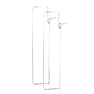 May include: A pair of silver-colored rectangular drop earrings. The earrings are long and slender, with a simple, minimalist design. The earrings are made of a shiny, reflective metal and are displayed against a white background.