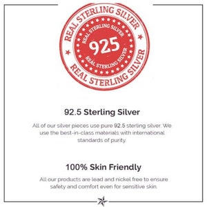 May include: A white background with a red circular stamp that reads "REAL STERLING SILVER" around the edge. The number "925" is in the center. Below the stamp, text states "92.5 Sterling Silver" and "100% Skin Friendly".