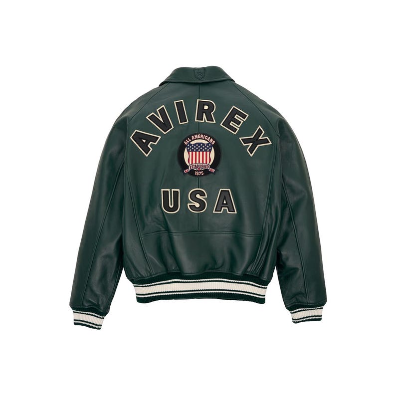 Side angle view of men’s sky blue genuine leather bomber jacket with ribbed striped cuffs and premium varsity style design