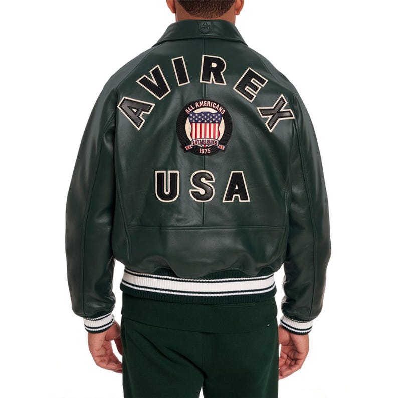 Premium sky blue leather bomber jacket for men featuring oversized AVIREX USA back embroidery and vintage streetwear fashion look