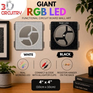 May include: A square 4 inch by 4 inch functional circuit board wall art piece featuring a giant RGB LED. Available in white or black, the design includes a real working LED, alligator clip connectors, and a resistor hanger on the back.