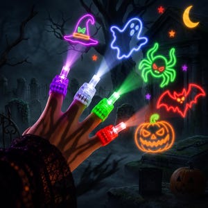 May include: Four colorful LED finger lights worn on fingers, each projecting a distinct Halloween-themed neon glow pattern onto a dark background. The projections include a purple witch hat, a blue ghost, a green spider, and an orange pumpkin.