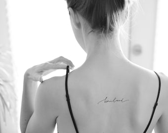 Cursive Script Whimsical Handwriting Tattoo