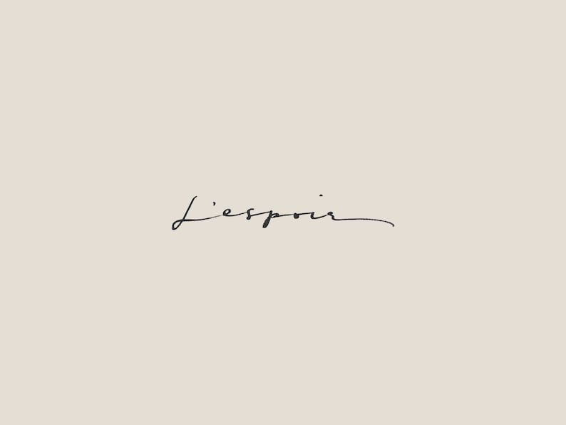 May include: A handwritten inscription in black ink on a white background reads "L'espoir."