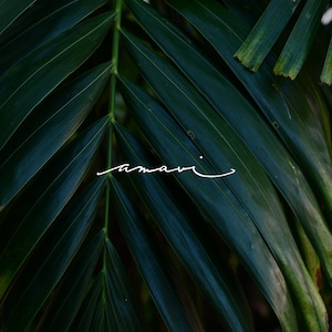 Flowing Cursive Tattoo Design - Beautiful Small Tattoo