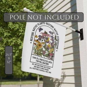May include: White garden flag featuring a colourful illustration of wildflowers within a window arch. The text reads "Restore Native Plants - Restore Native Ecosystems + This is a protected area for pollinators. We are sheltering and feeding our insect & bird friends in a pesticide & chemical-free zone". The flag measures 62.2 cm by 81.3 cm.