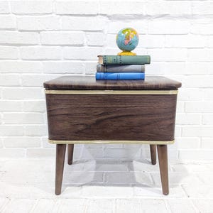 Vintage Faux Wood Foot Stool with Storage // Retro Brown Vinyl Ottoman Bench Wooden Legs, Mid Century Modern Sewing Box Storage Burlington