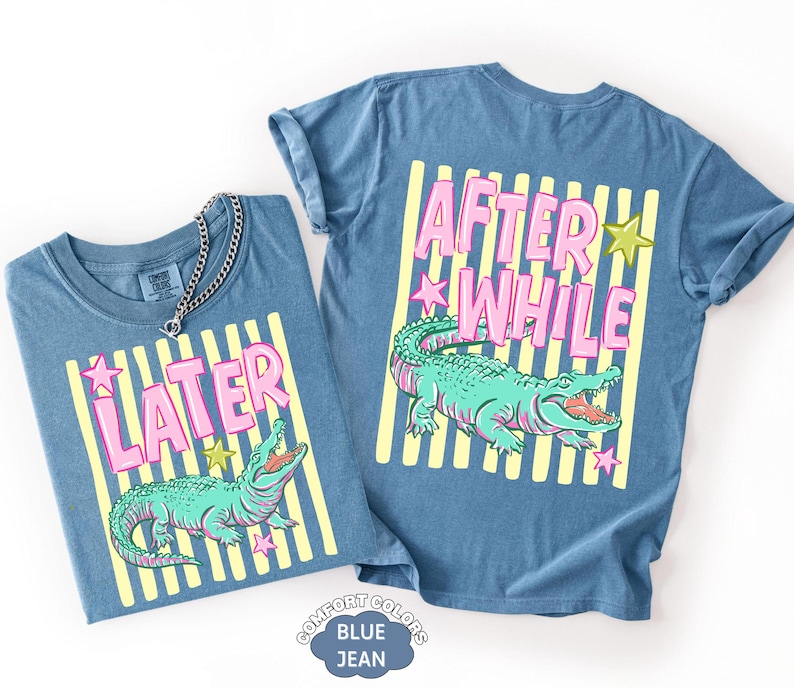 May include: Two blue jean-colored t-shirts with matching designs. The front shirt says "LATER" in pink letters with a green alligator graphic. The back shirt says "AFTER WHILE" with a matching alligator graphic.