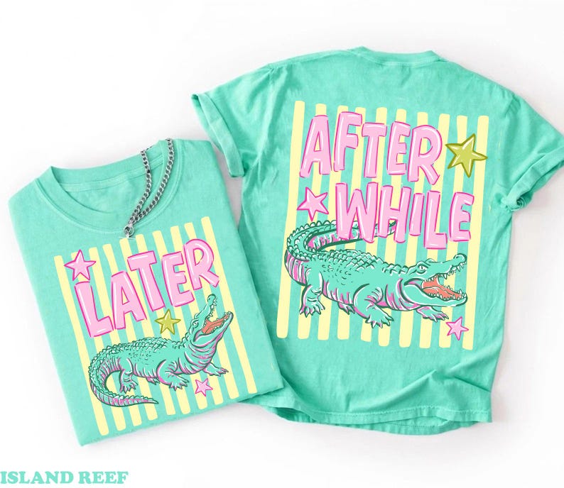 May include: Two turquoise t-shirts with matching designs. Each shirt features a cartoon alligator with an open mouth, pink text, and yellow stripes. One shirt says "LATER", the other says "AFTER WHILE".